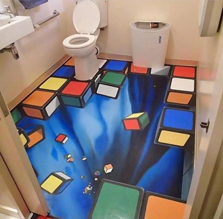 8. Zmień toaletę w pokój iluzji za sprawą oszałamiającej podłogi.