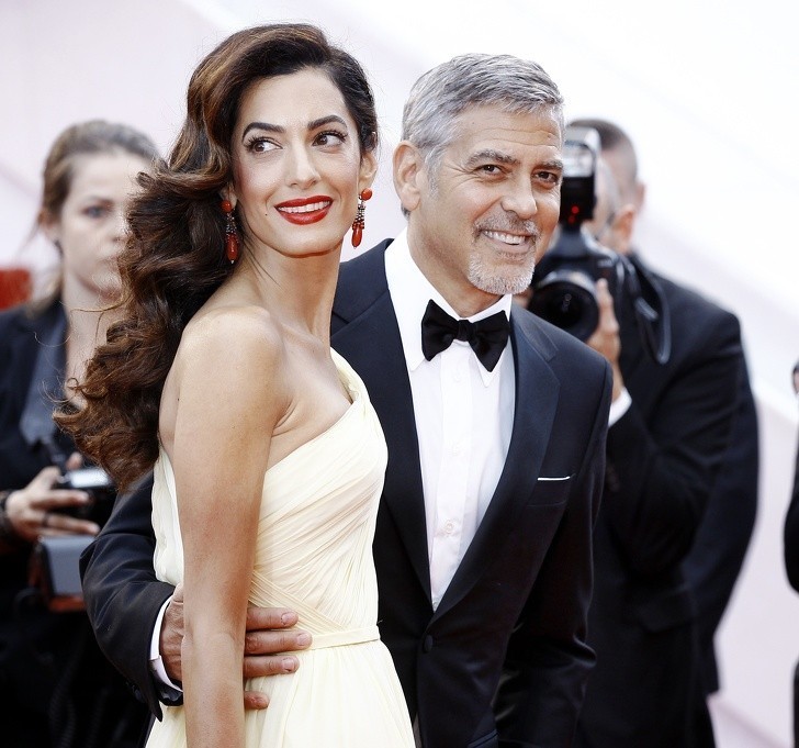1. George'as ir Amal Clooney