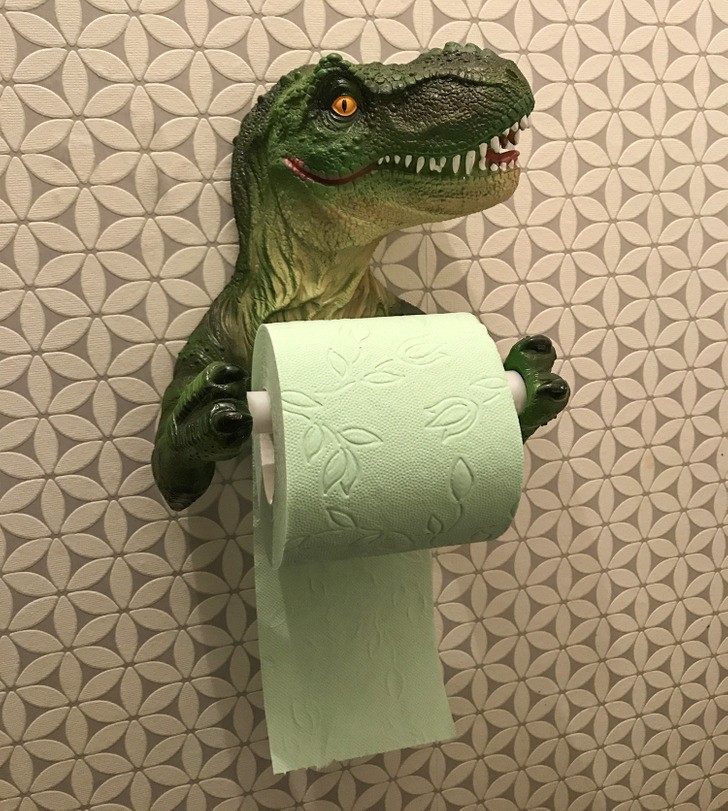 Uchwyt na papier toaletowy w kształcie dinozaura