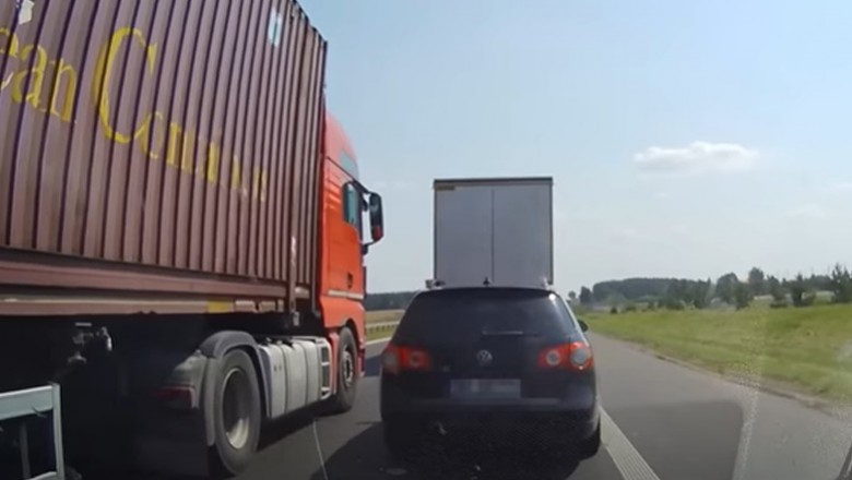 Szeryf w ciężarówce blokuje i spycha osobówki z pasa 